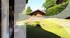 Appartement en rez de jardin offrant 4 chambres ouvertes sur un beau jardin de plus de 500 m² environ
